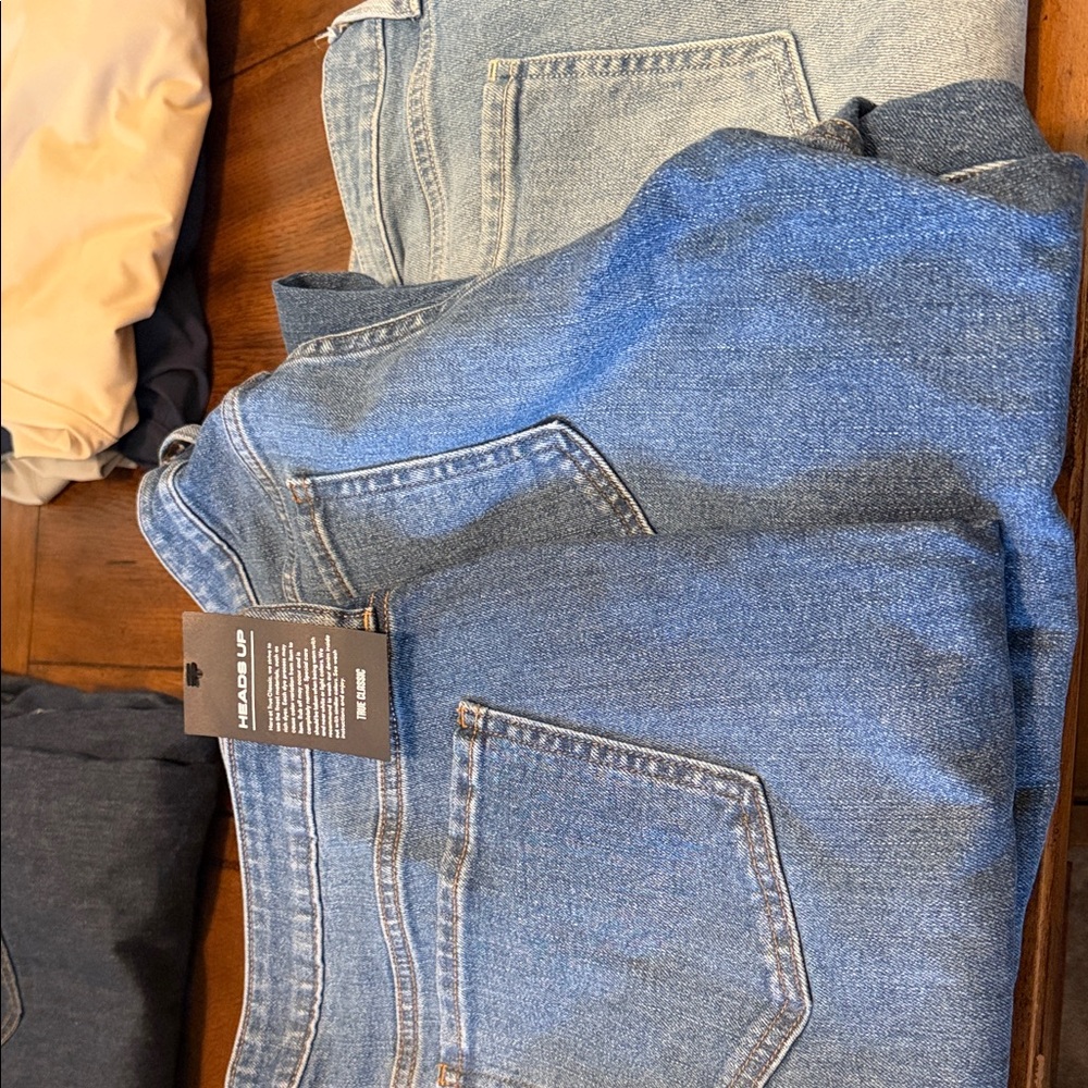 Men's Relaxed Jeans in Light and Medium Blue. All 3 pair together for sale.